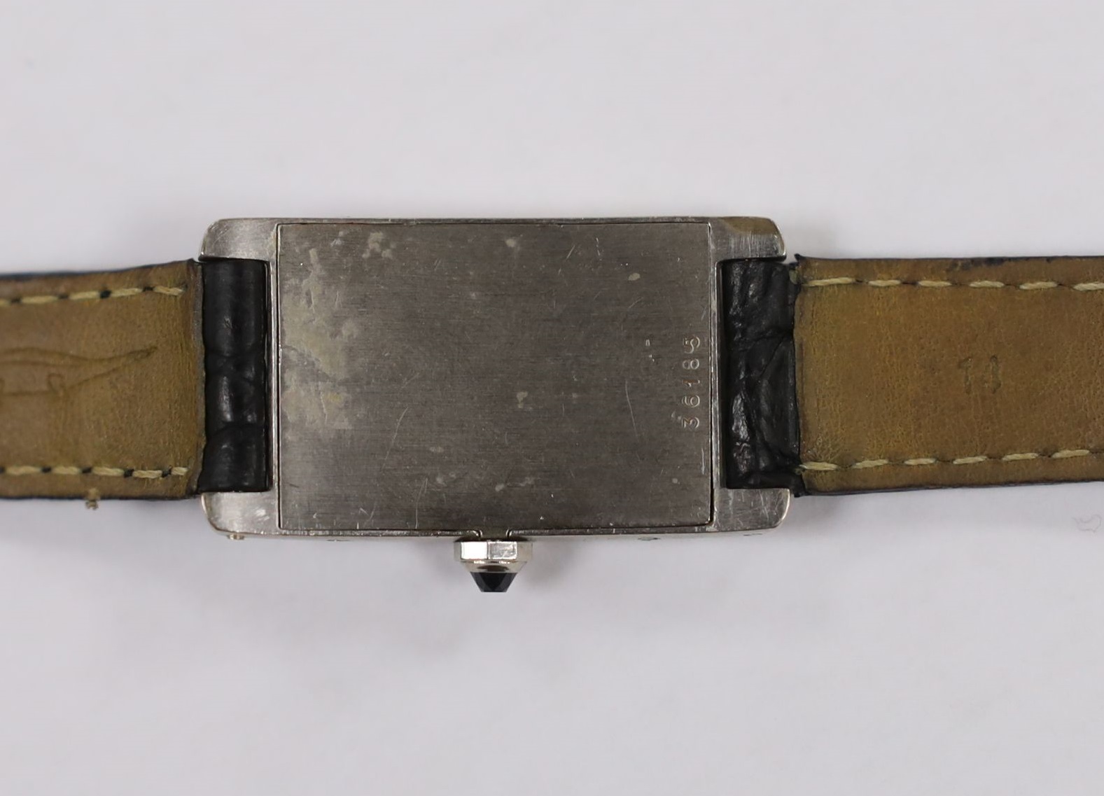 A 1920's 18ct white gold Cartier Tank Cintree (7 lignes model) manual wind wrist watch, with later 1970's movement